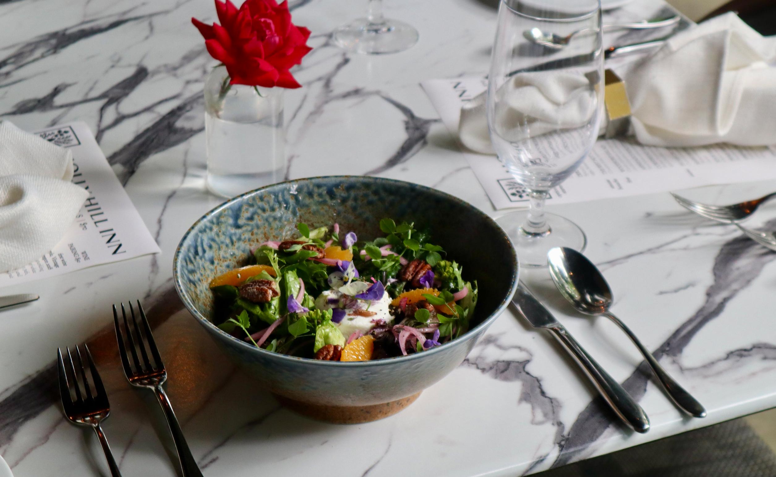 Salad in a bowl at Holly Hill Inn