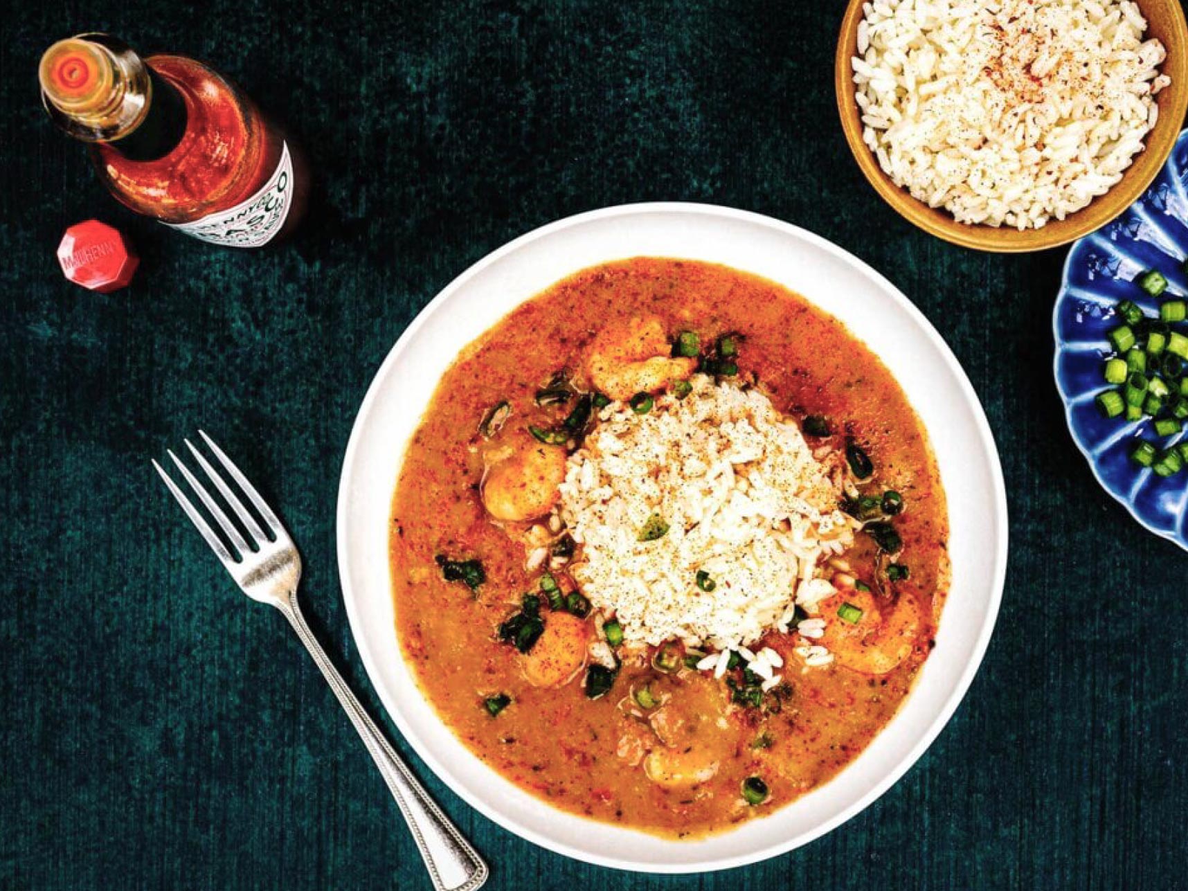 Plate of Shrimp Etouffee with a side of Tabasco brand sauce