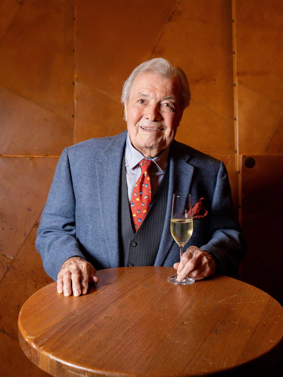 Jacques Pépin with a glass of wine