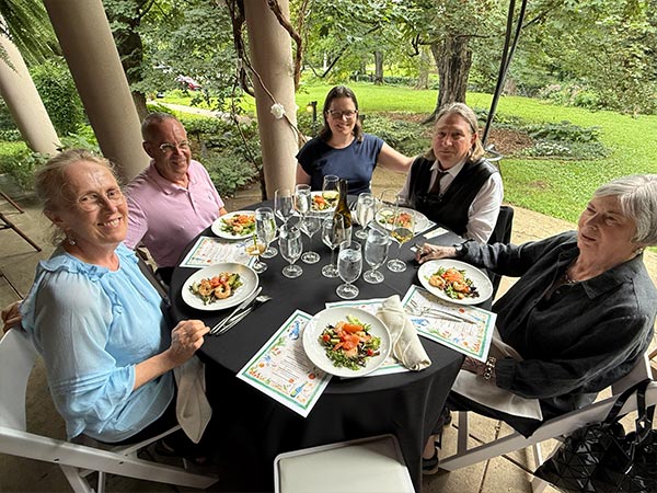 Diners at Holly Hill Inn's 90/90 dinner event